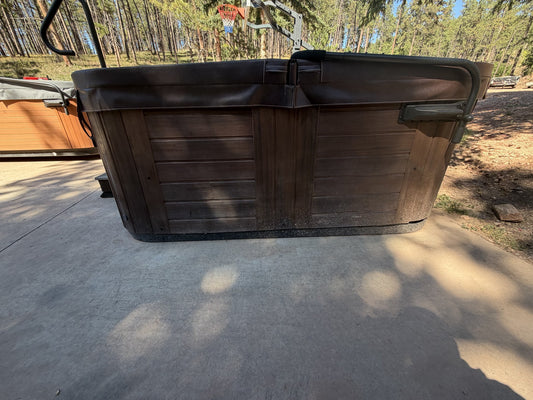 Marquis Epic hot tub cabinet with Marquis badge
