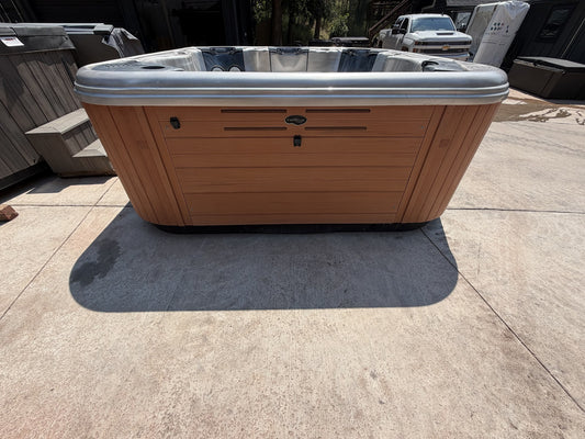 Refurbished Bull Frog Spa hot tub, front view with cabinet