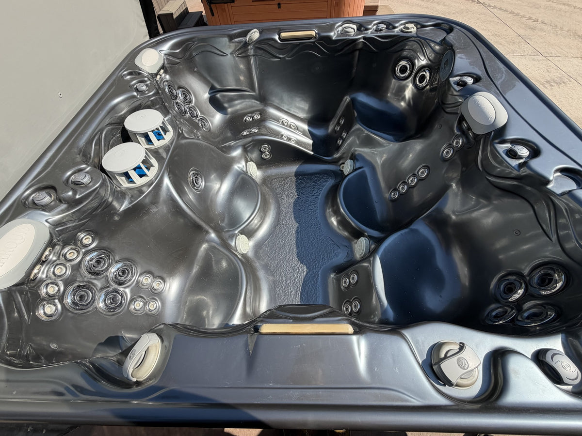 Refurbished Marquis Epic hot tub interior with Adirondack chair seating